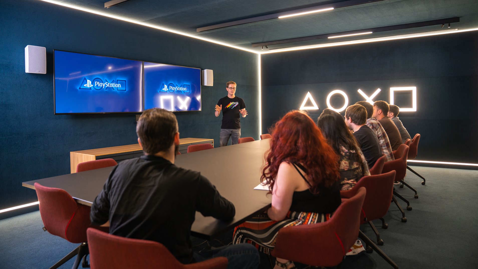 Employees sitting in a conference room