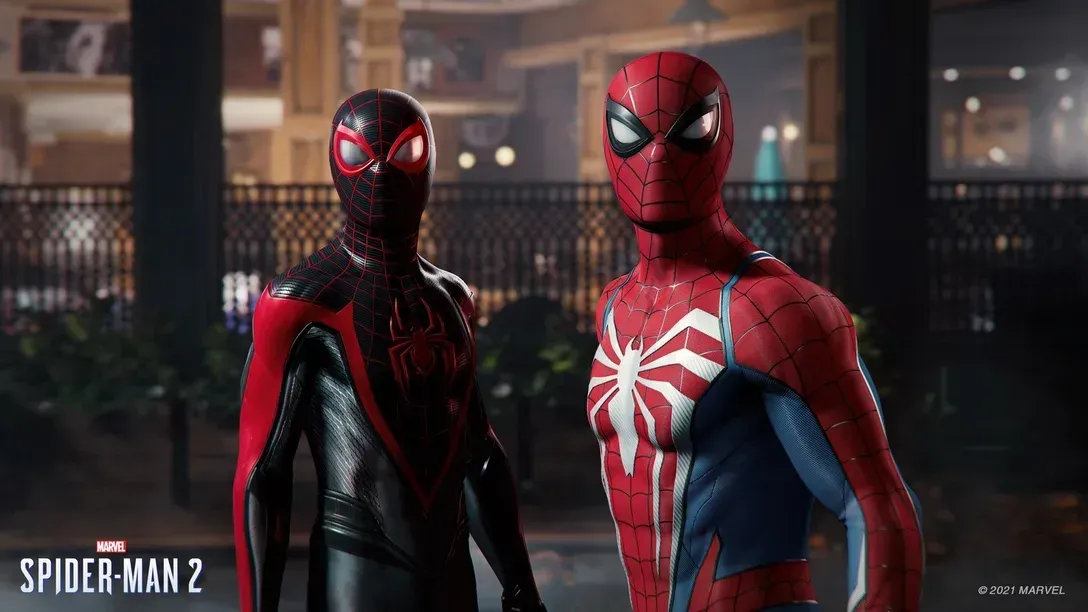 Miles Morales and Peter Parker side-by-side in their suits from Marvel's Spider-Man 2 video game.
