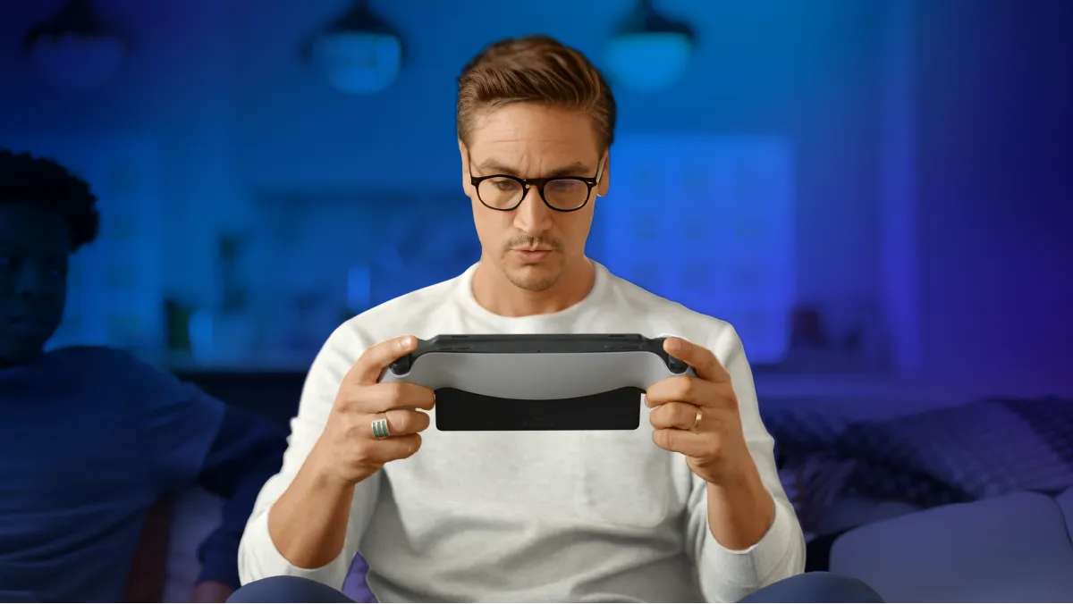 Gamer focused while playing on PlayStation Portal.